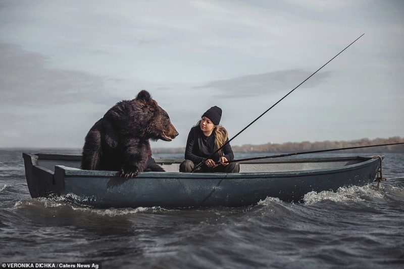 The woman and her rescued brown bear love to go fishing together