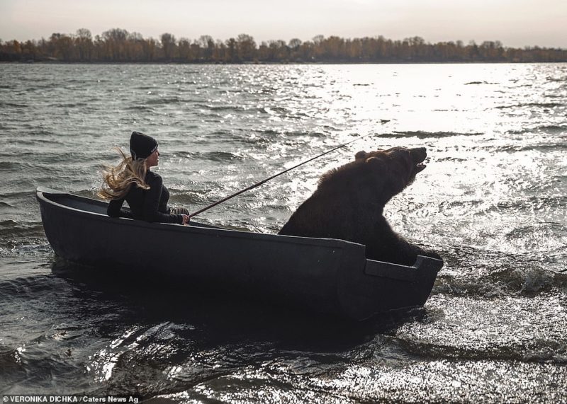 The woman and her rescued brown bear love to go fishing together