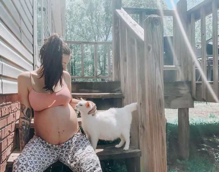 A woman has found the cutest pregnancy buddy ever